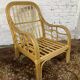 Fauteuil chauffeuse vintage en rotin des années 70