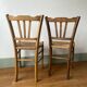 Set of 2 old mulched wooden chairs