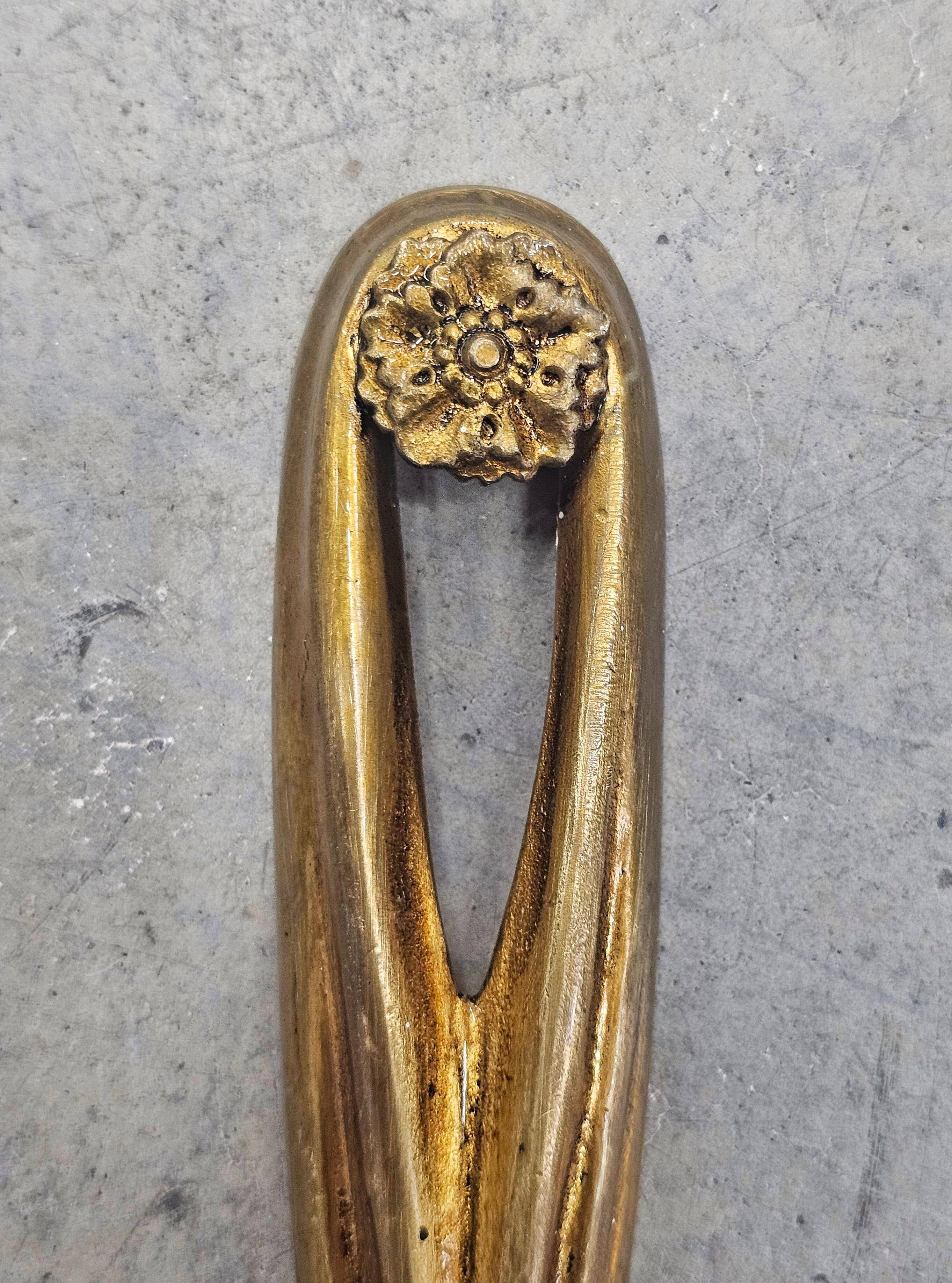 Pair of Louis XVI style bronze wall sconces with bow and tassel, 1940s.