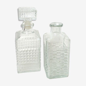 Set of 2 bottles carved glass