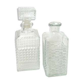 Set of 2 bottles carved glass
