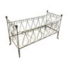 Old baby bed in wrought iron