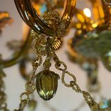 Venetian chandelier in multi-colored Murano glass with a green dominant color, 12 light arms, circa 1880
