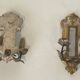 Pair of wall sconces in carved wood and silvered and gilded patinated metal with a central mirror.