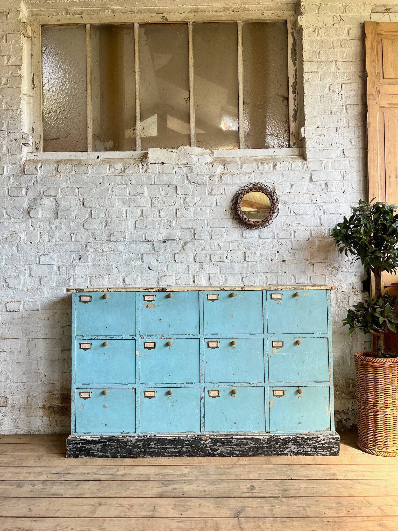 Old workshop cabinet with flaps, original patina.
