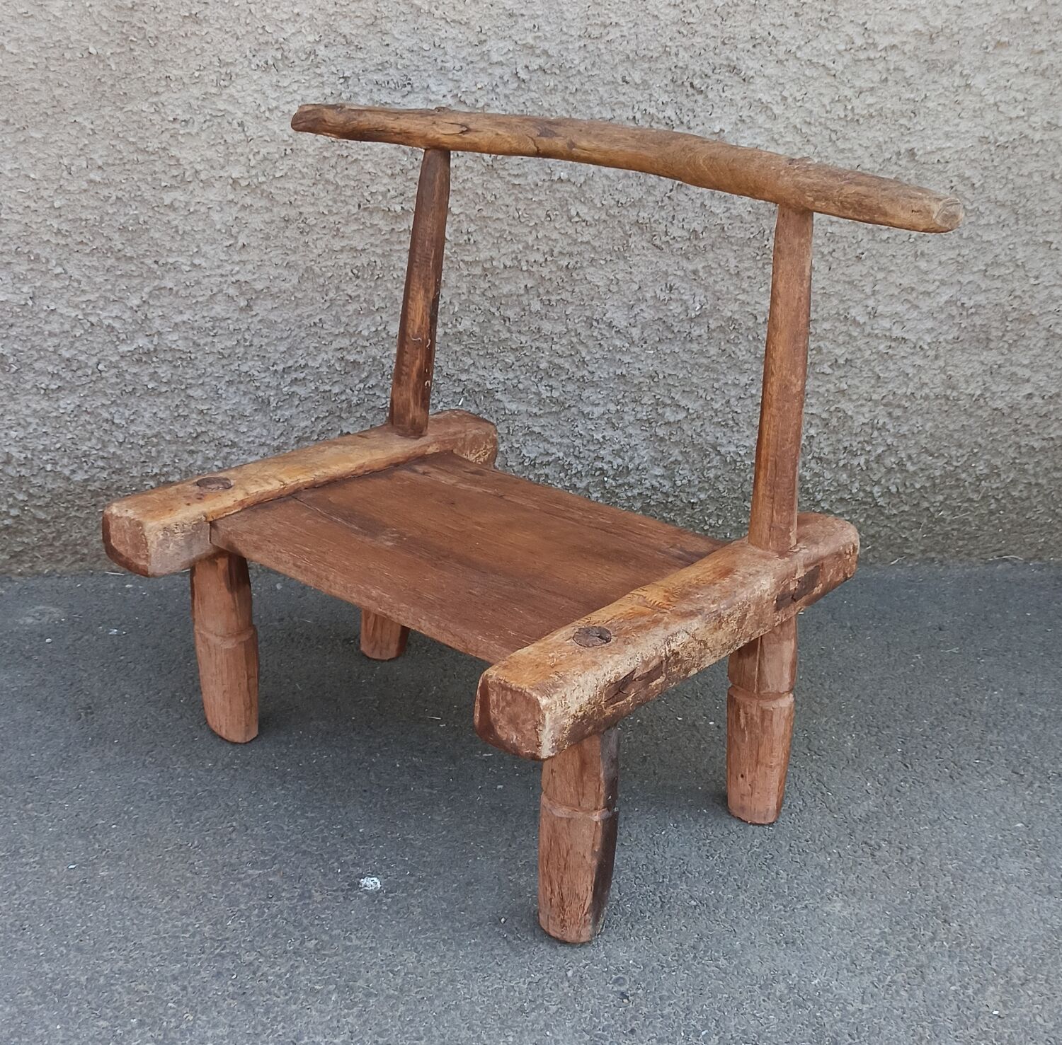 Antique wooden stool. Baoulé African art from Ivory Coast.