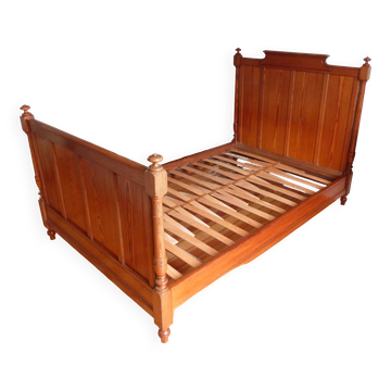 Single wooden bed in pitch pine