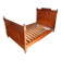 Single wooden bed in pitch pine
