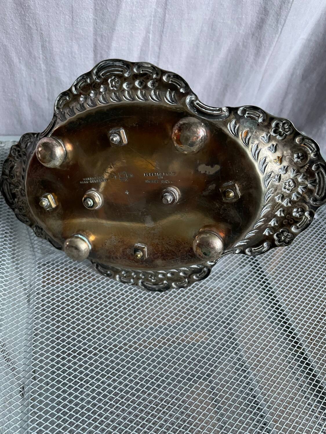 Antique egg set in nickel silver metal