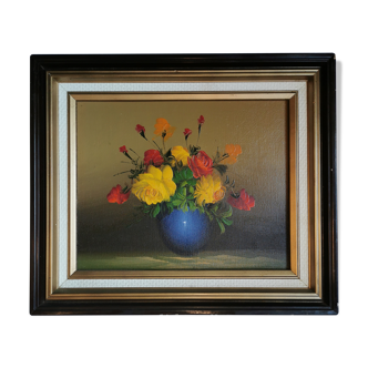 Bouquet of red and yellow oil roses on ancient canvas