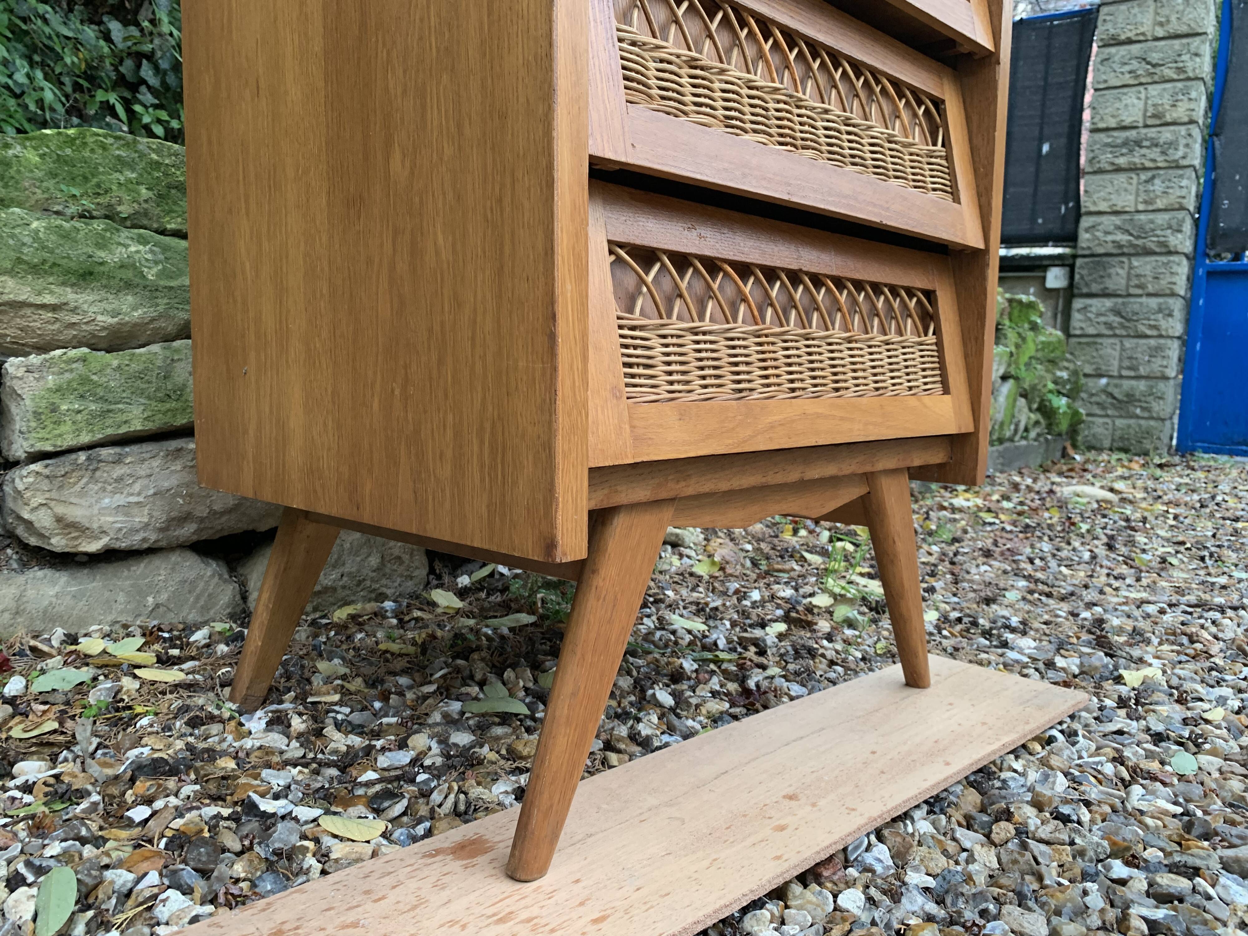 Vintage rattan chiffonier with compass feet 1950