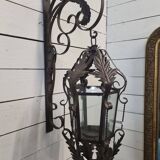 Patinated iron wall lantern
