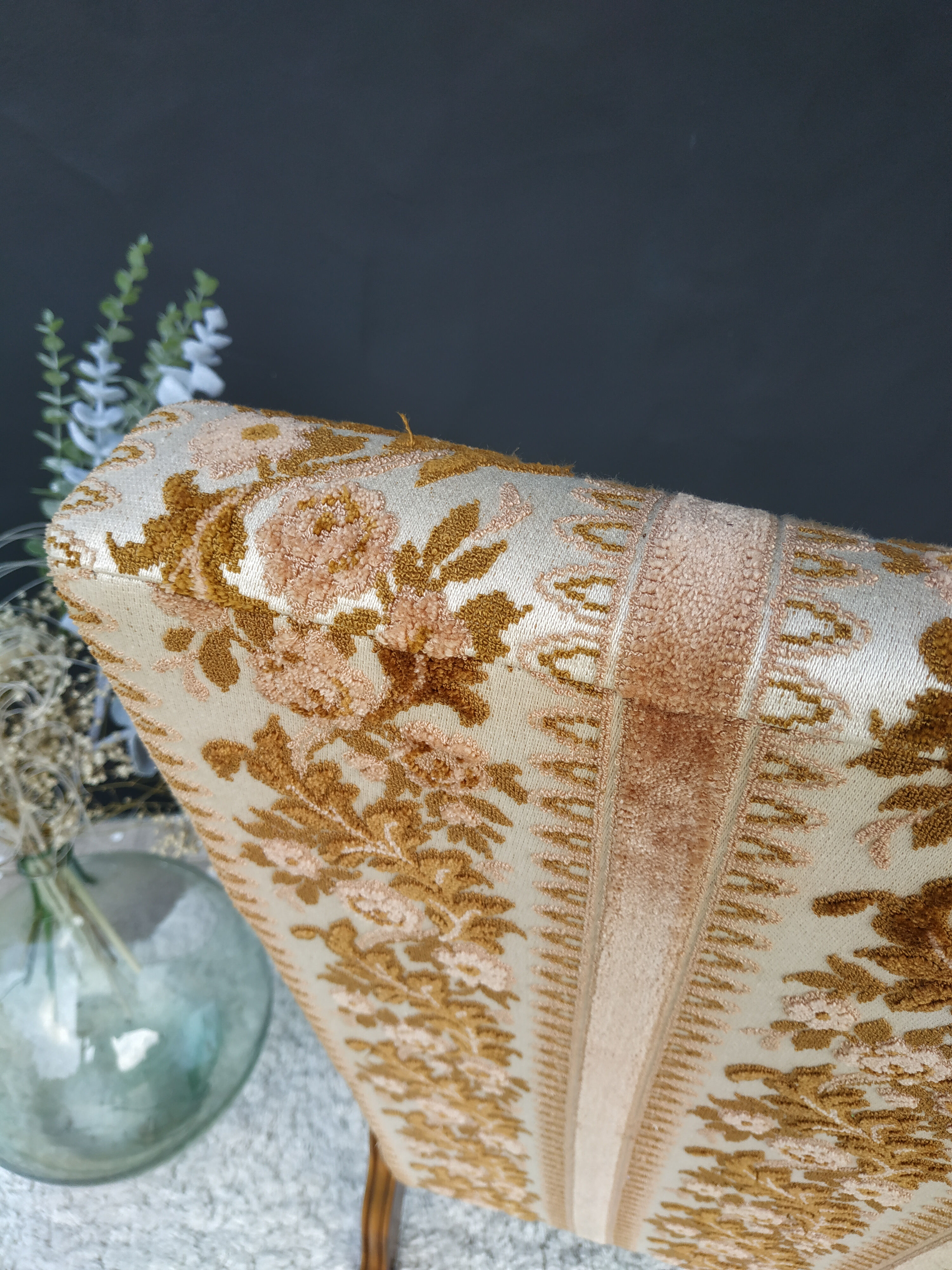 Floral-patterned velvet armchair