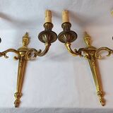 Pair of bronze wall sconces in Louis XVI style