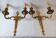 Pair of bronze wall sconces in Louis XVI style