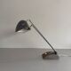 Large metal desk lamp with Wood Design texture by Eileen Gray, 1950s, France.