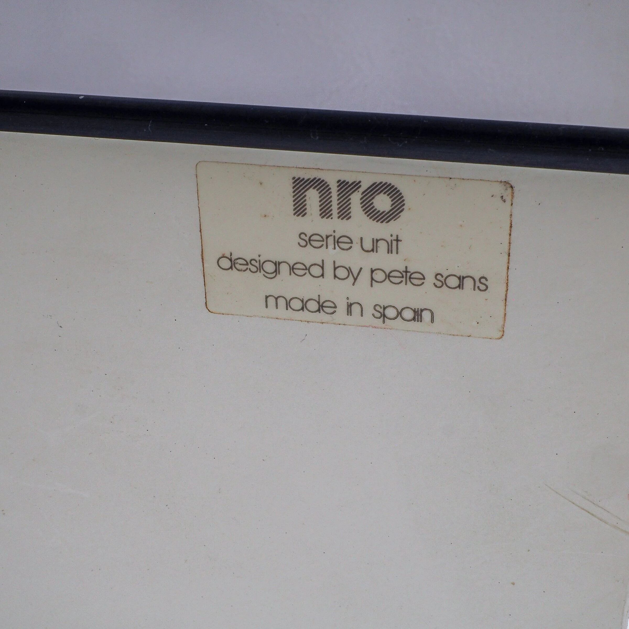 Metal magazine holder by Pete Sans for NRO