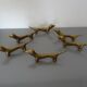 Series of 6 vintage gilded brass dachshund knife holders