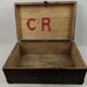Old wooden suitcase with a padlock