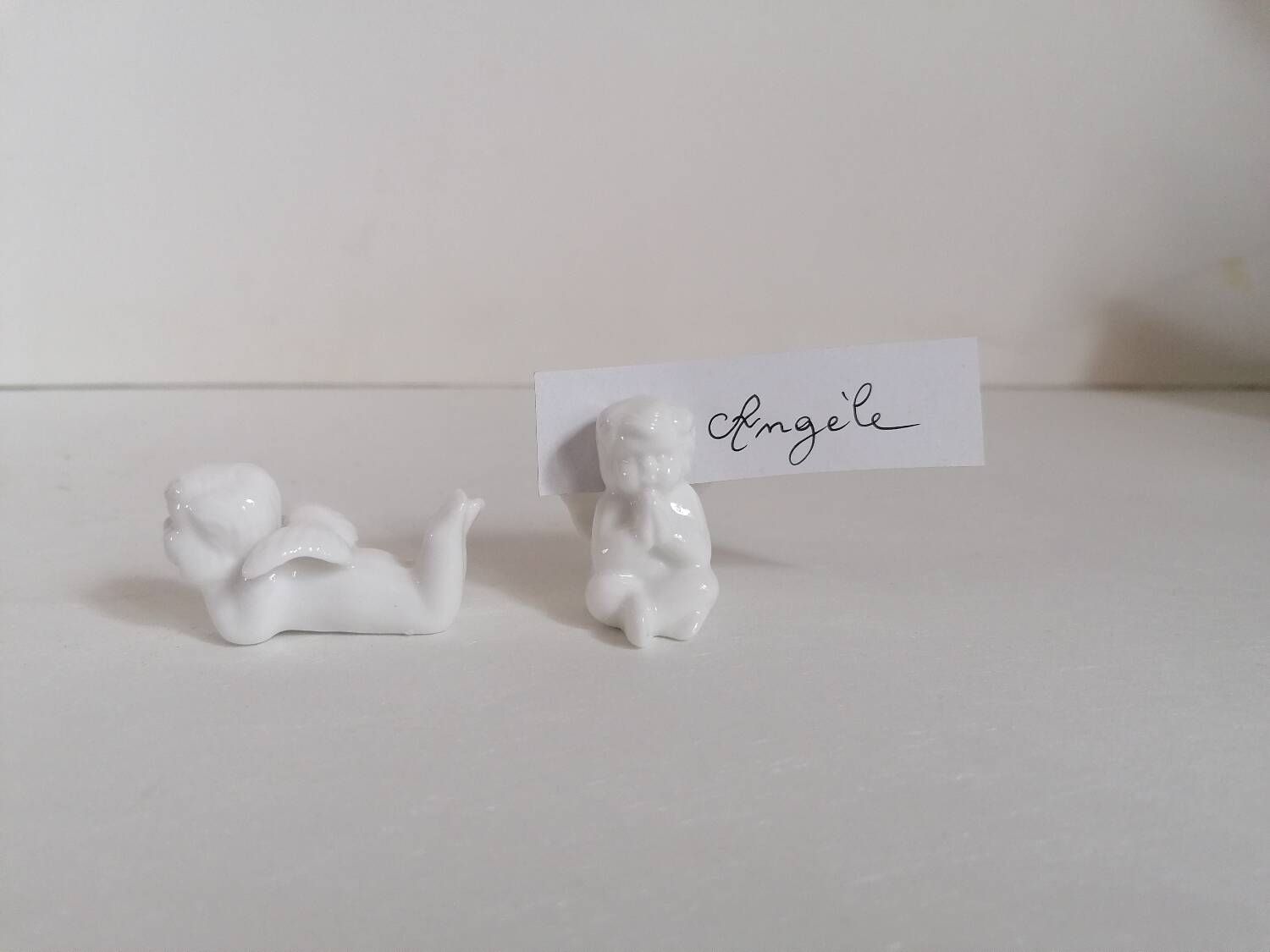 Lot 6 knife holders and 6 porcelain place markers putti angels