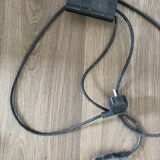Vintage halogen floor lamp in black lacquered metal and brass ball joint