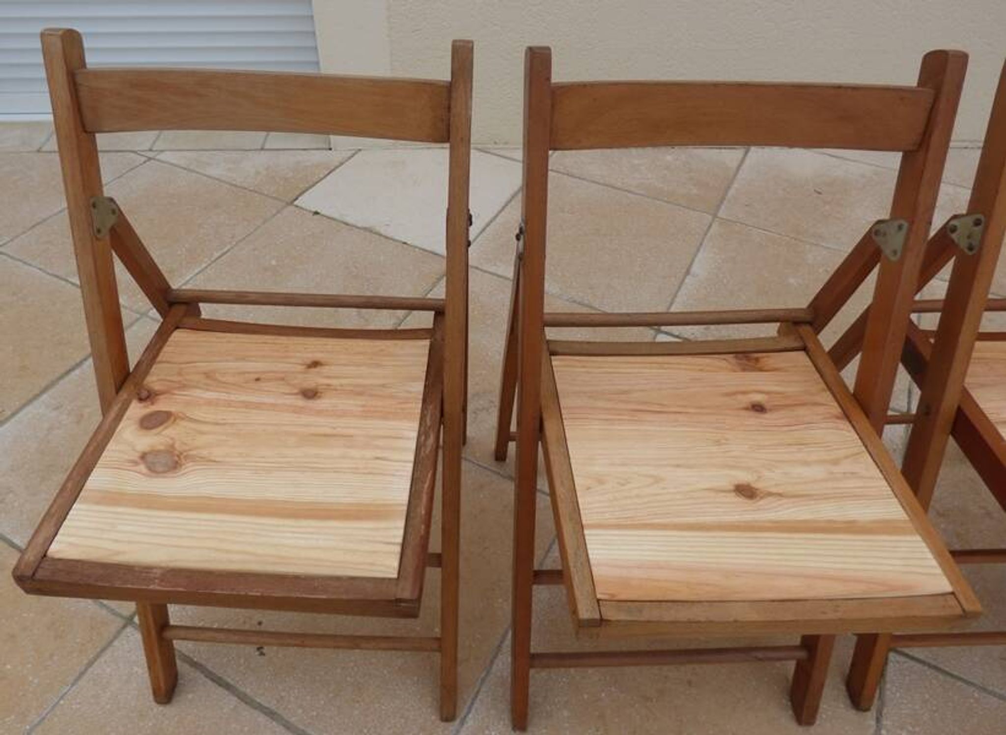 4 vintage varnished wooden folding chairs - Seats completely restored.