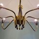 Spider chandelier in brass and black lacquered metal Italian design 1950s