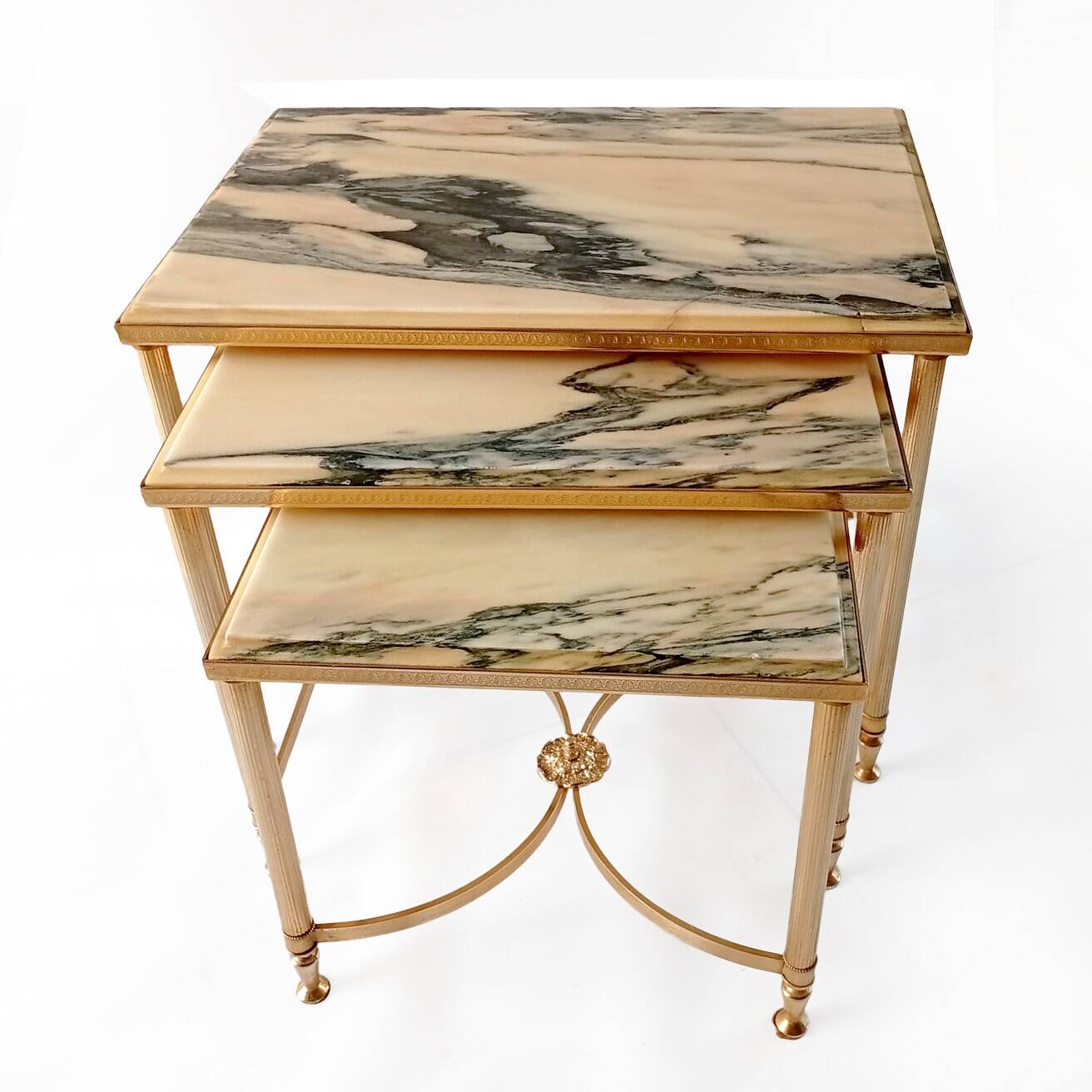 Nested tables in brass and marble.