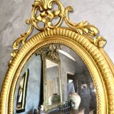 Antique oval mirror from the 20th century