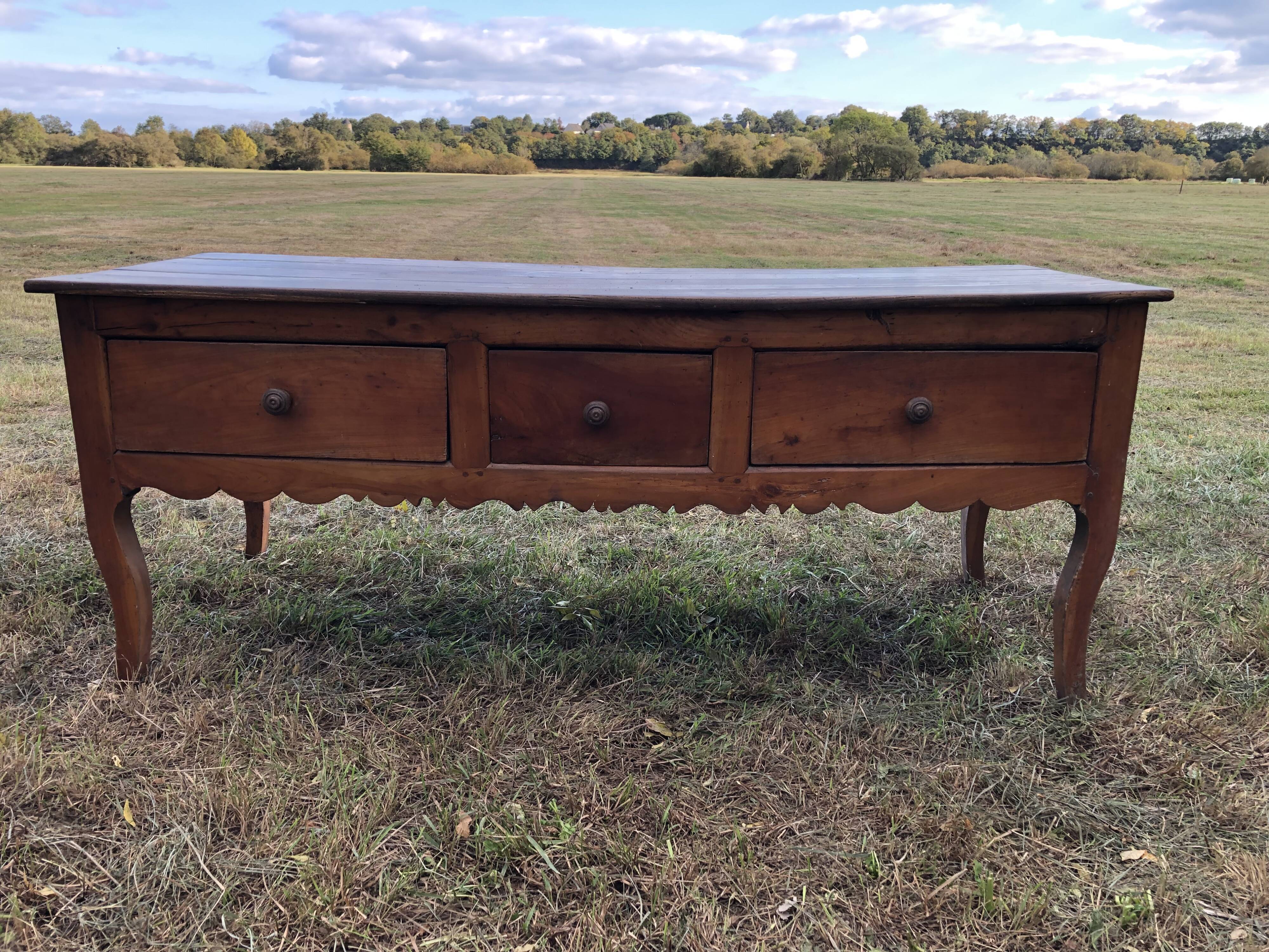 Antique Louis XV paneled table with 3 front drawers in solid cherry wood