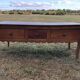 Antique Louis XV paneled table with 3 front drawers in solid cherry wood