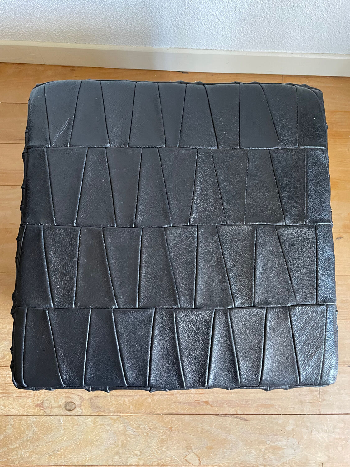 Black leather chest ottoman from Sède