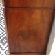 Walnut chest of drawers, black marble top