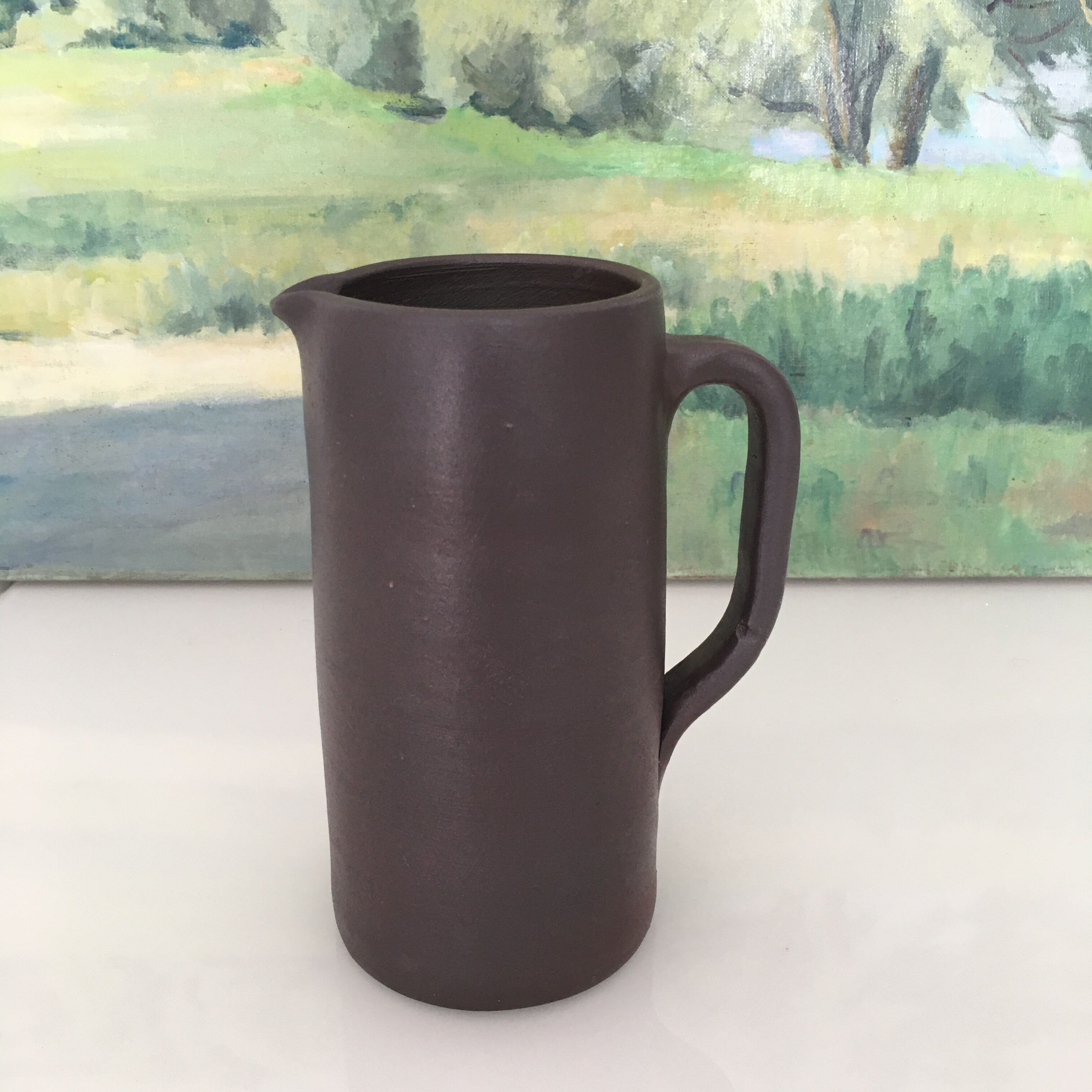 Dark brown sandstone pitcher