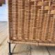 large wicker / rattan and black iron magazine rack from the 70s