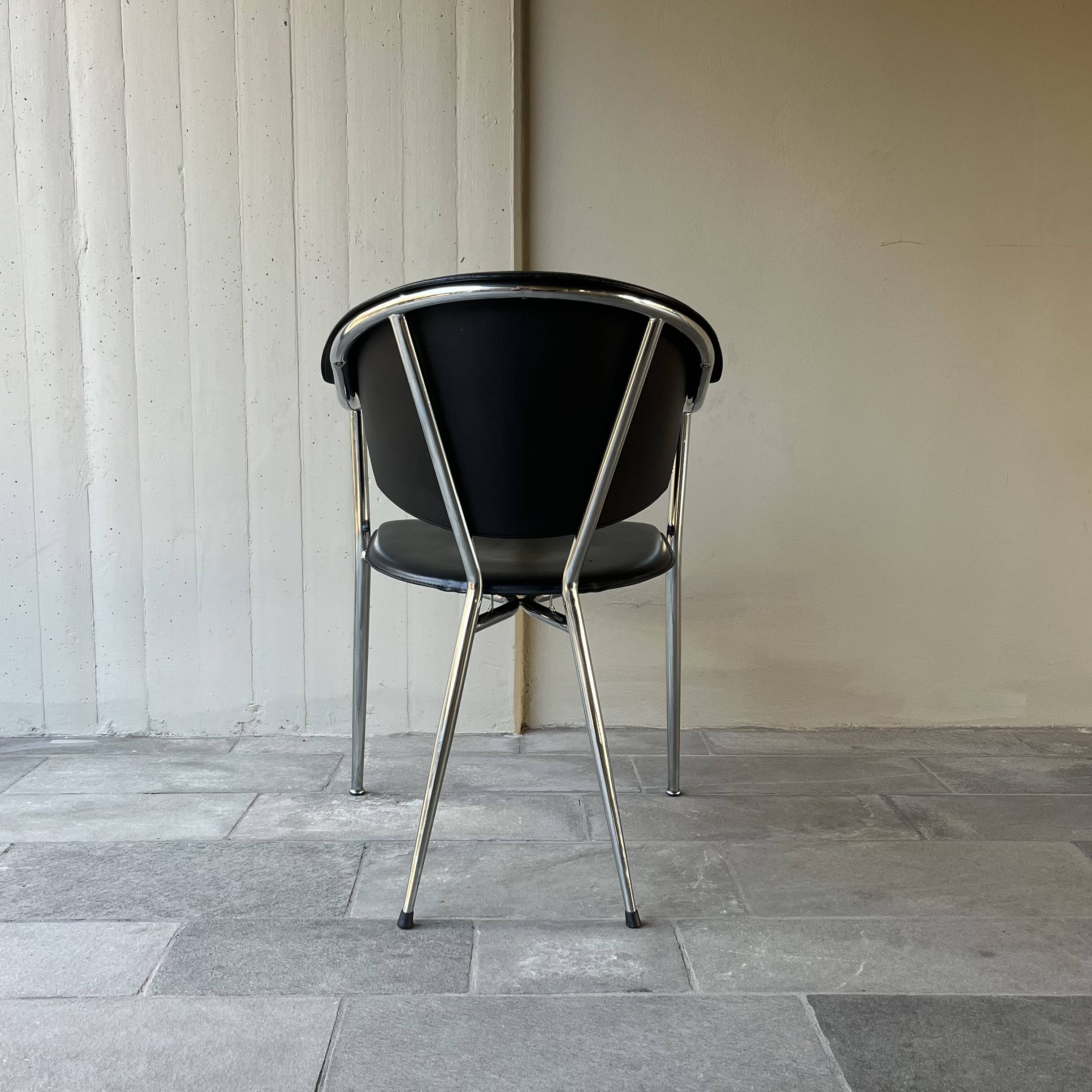 Set of four Italian black leather chairs, 1970