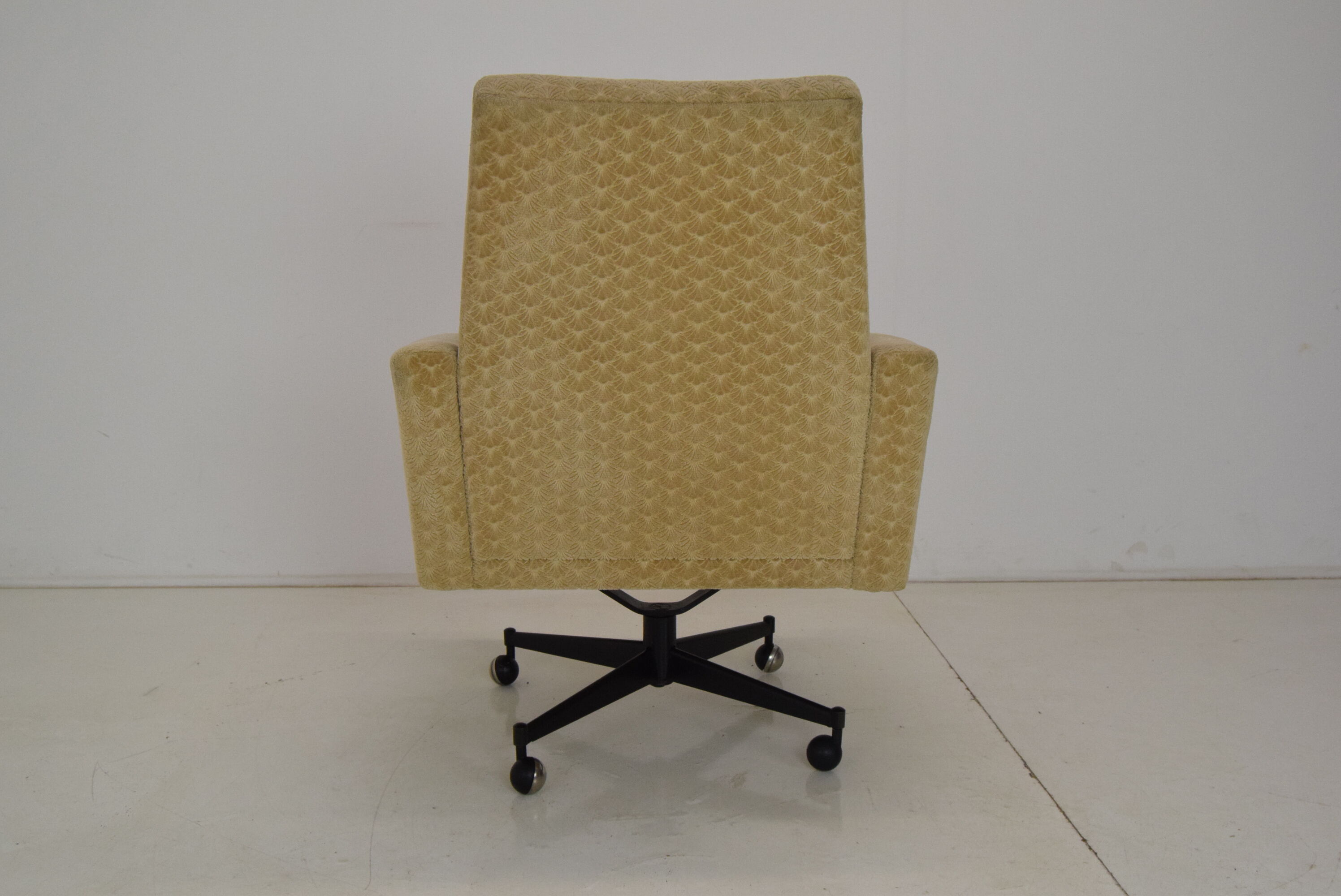 Mid-century swivel armchair with wheels 1970's