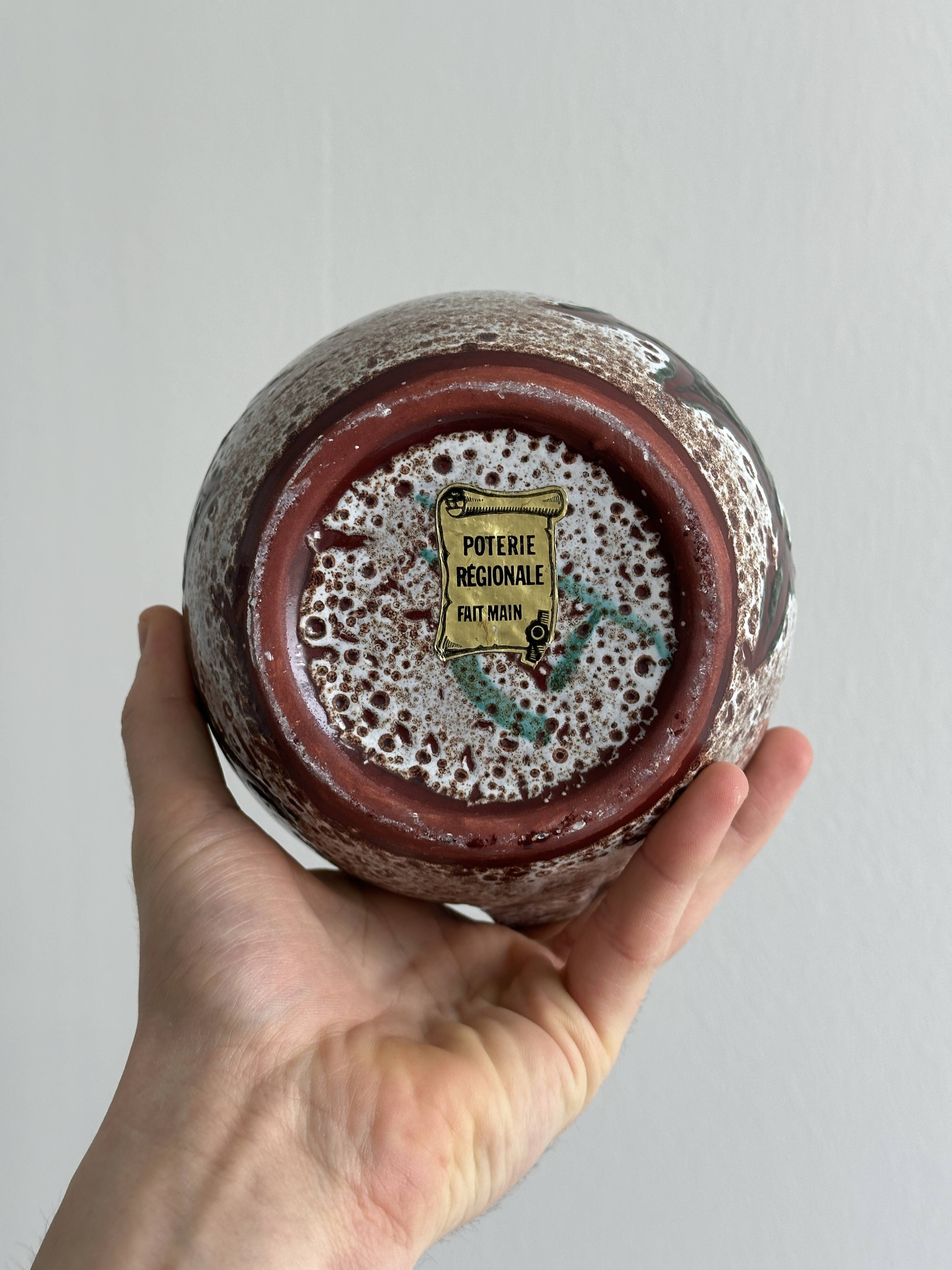 Antique decorative ceramic pitcher