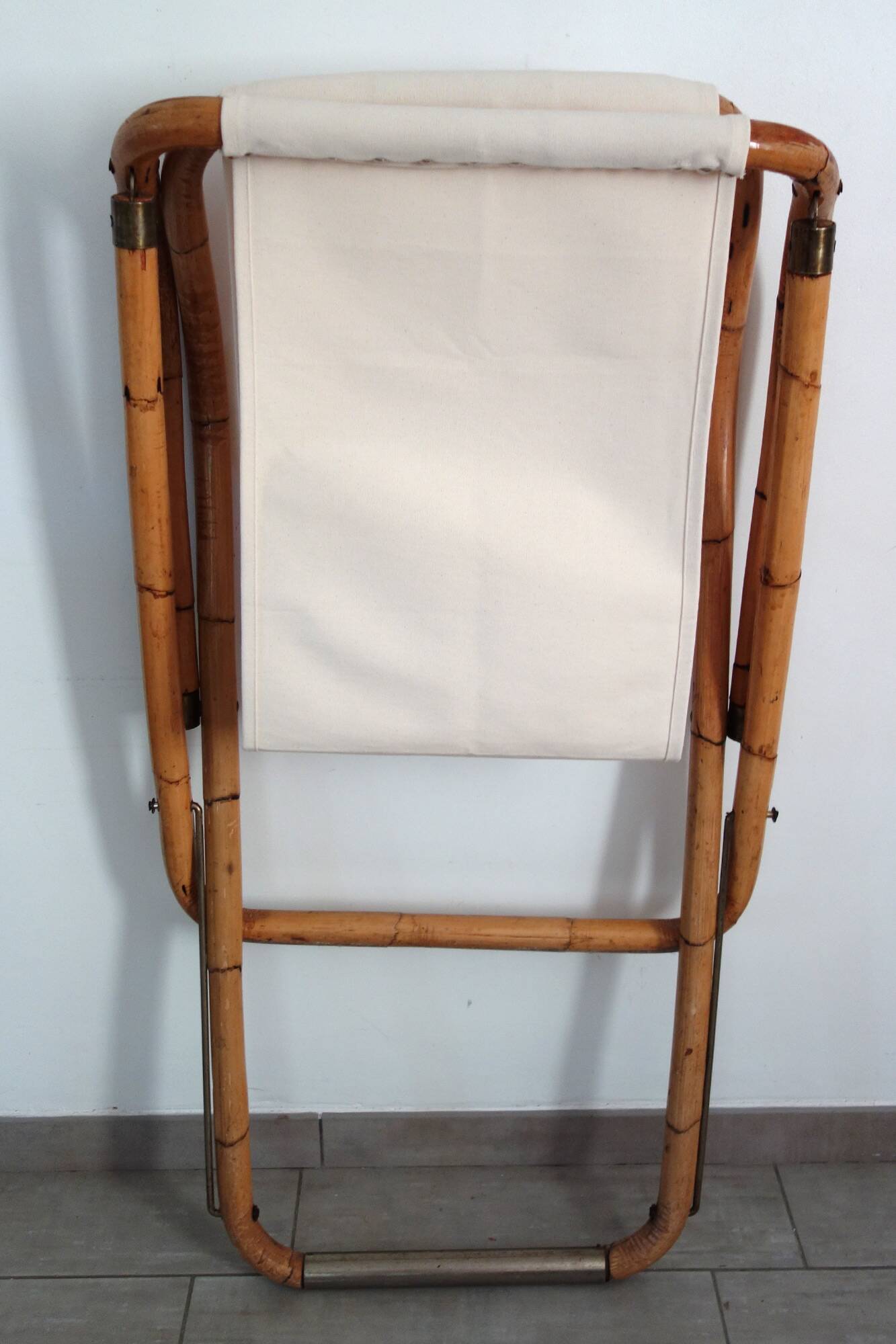 Pair of folding bamboo and brass deck chairs, Italy, 1960s.