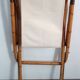 Pair of folding bamboo and brass deck chairs, Italy, 1960s.