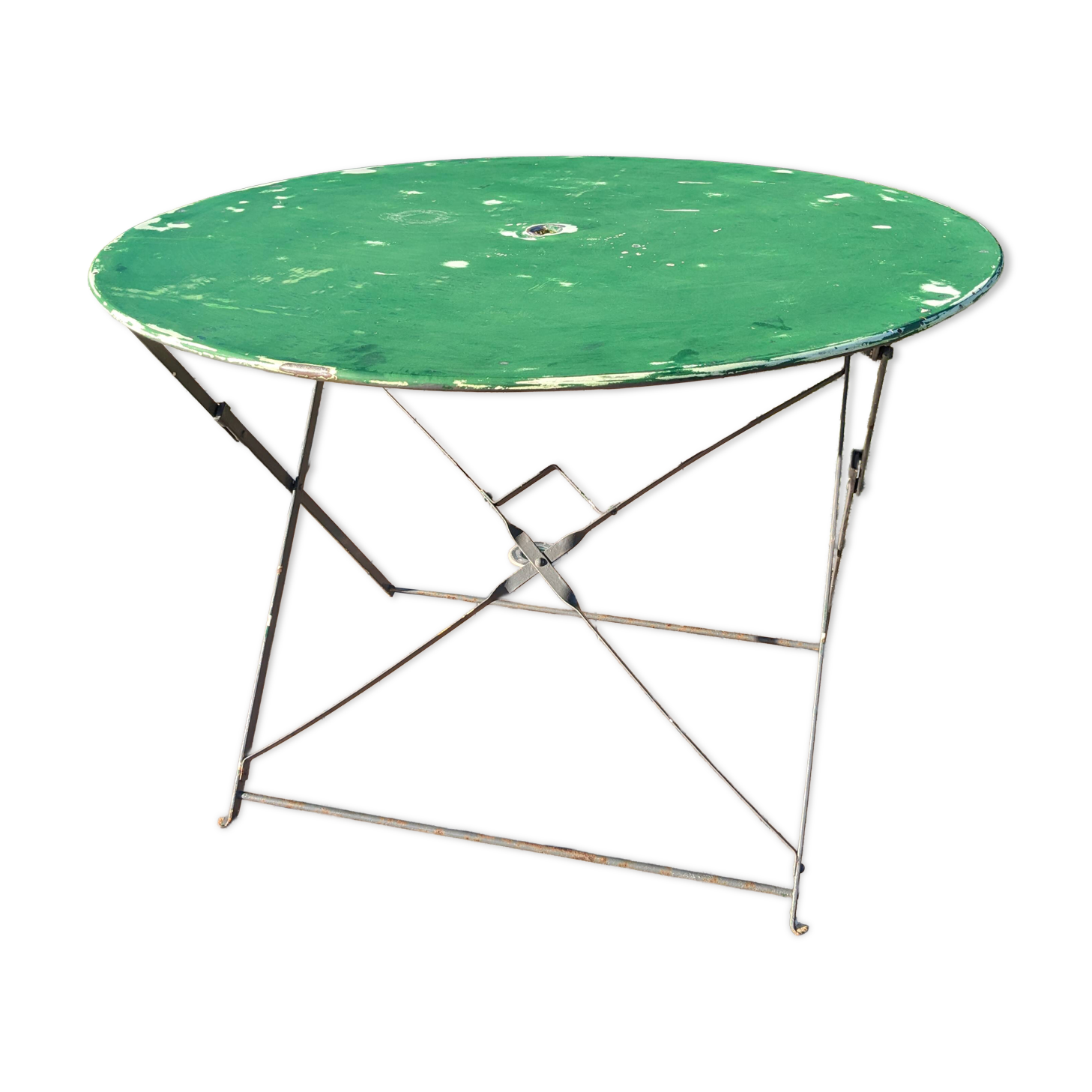 Antique round folding garden table with a green patina.
