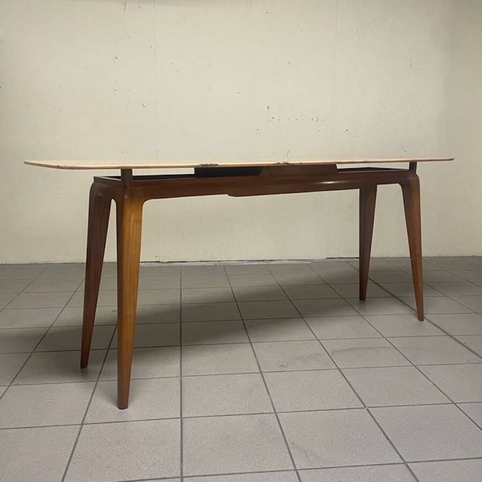 Console from the 1950s with a pink marble top and a cherry wood frame.