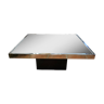 Table basse chromée dessus miroir fumé