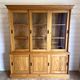 Large vintage display cabinet in solid pine with sliding doors, Country style.