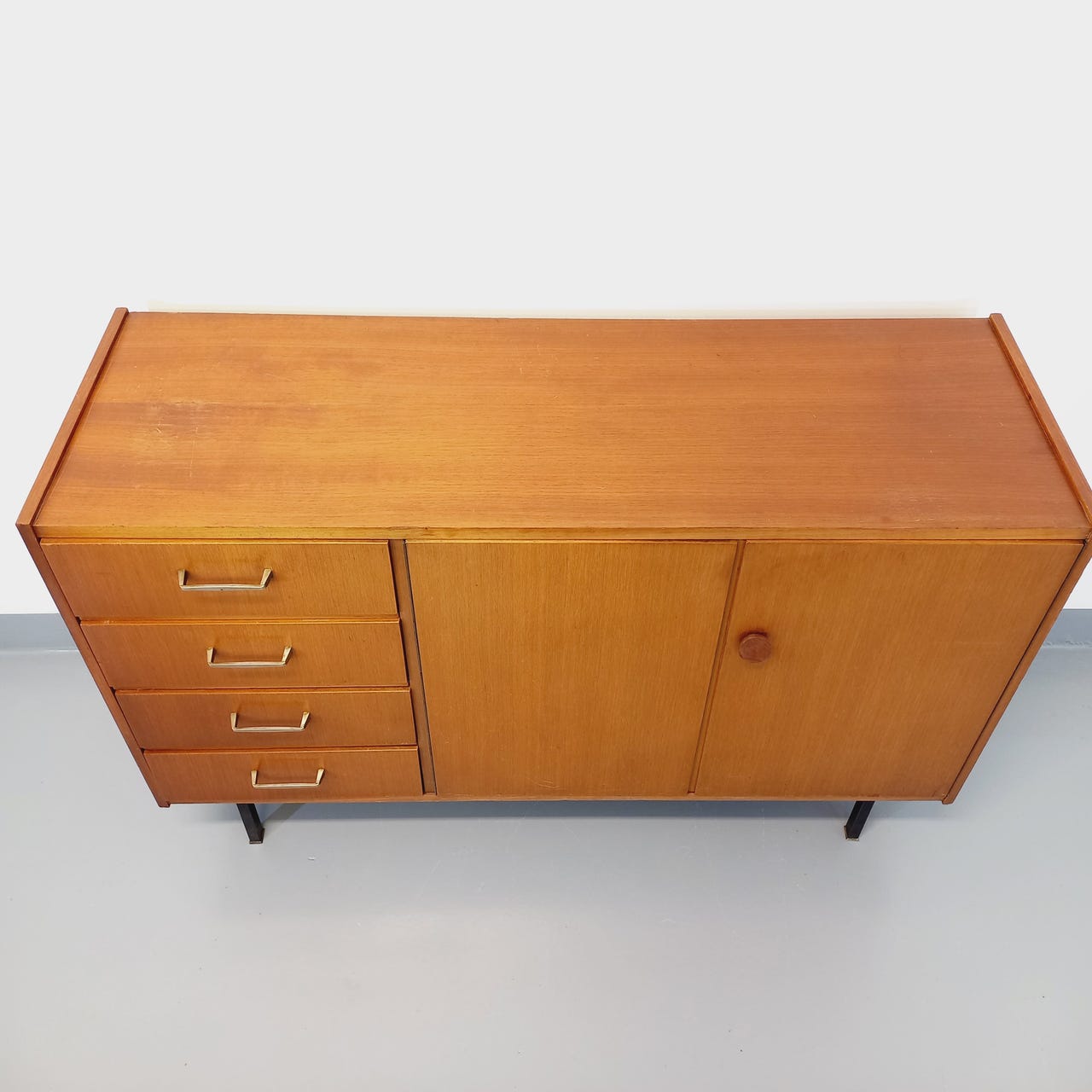 Vintage teak and black metal row from the 60s