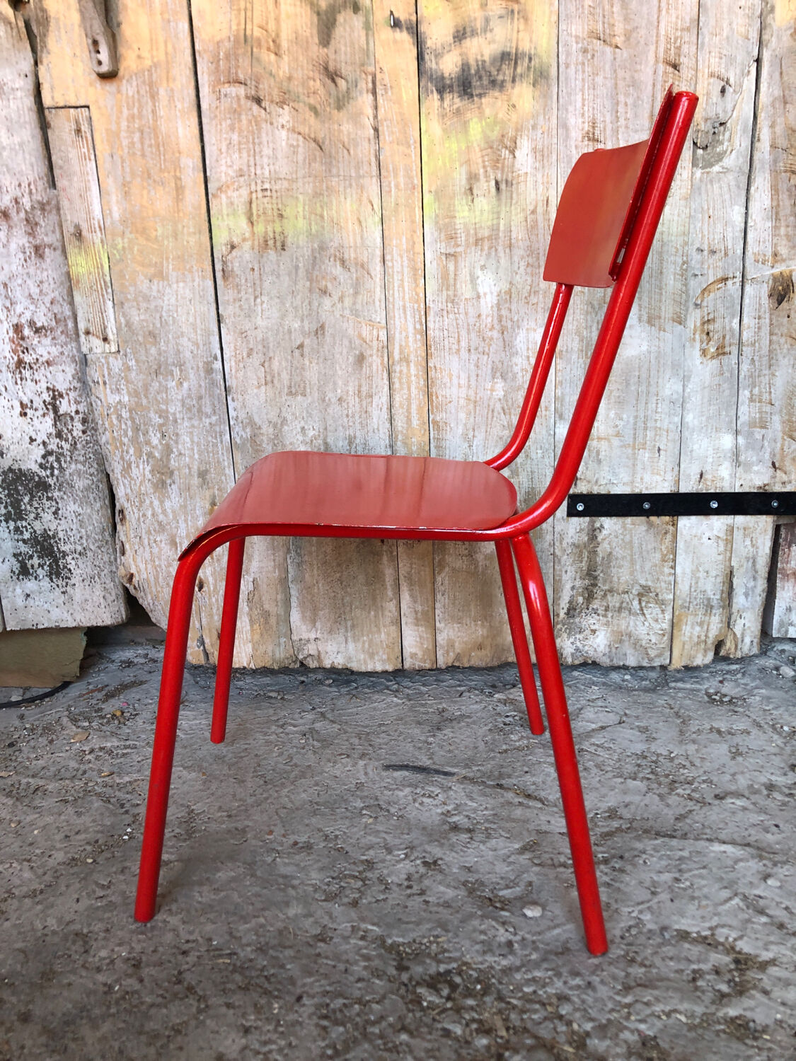 Set of 4 red metal chairs