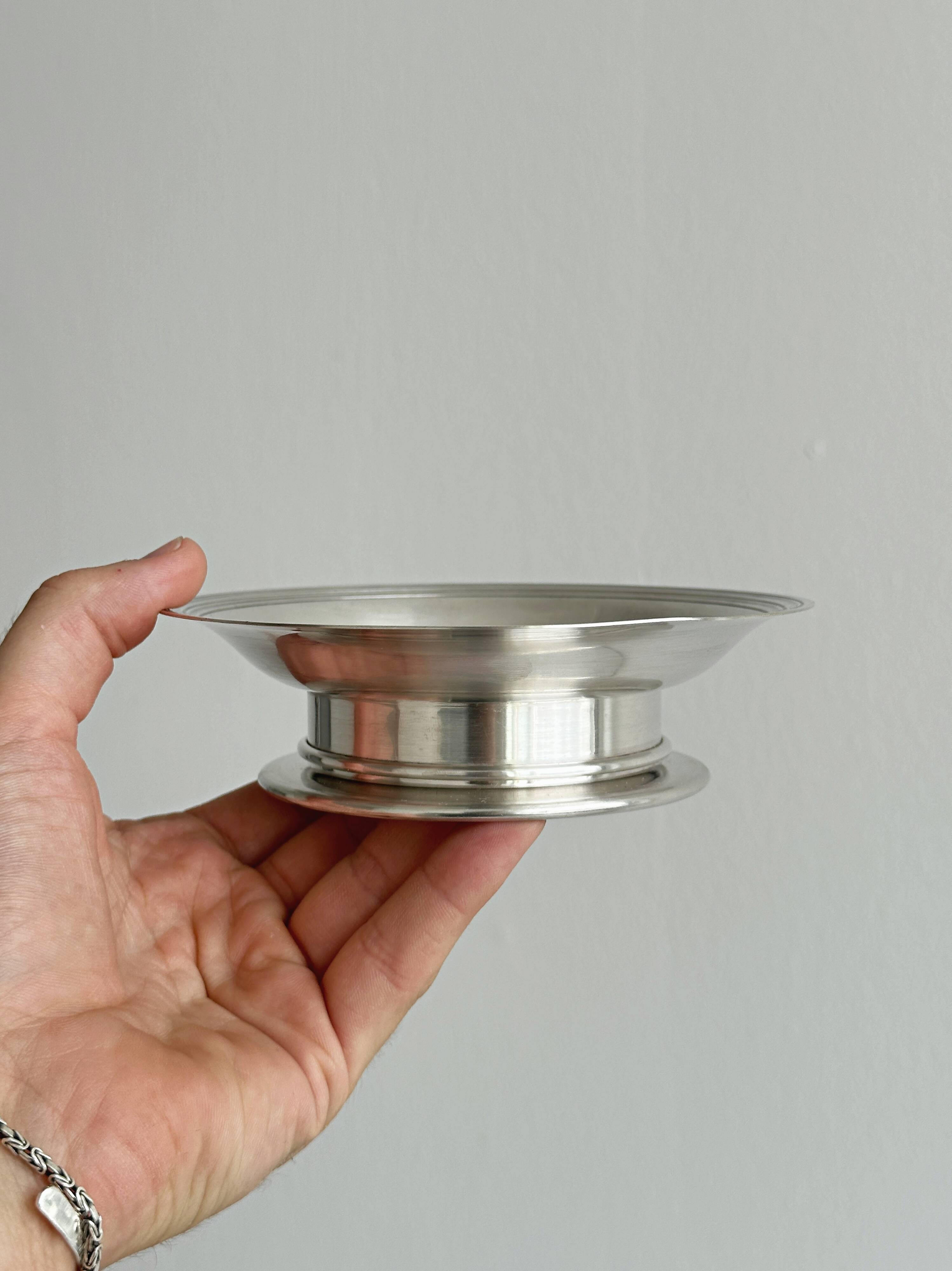 Antique shiny metal butter dish