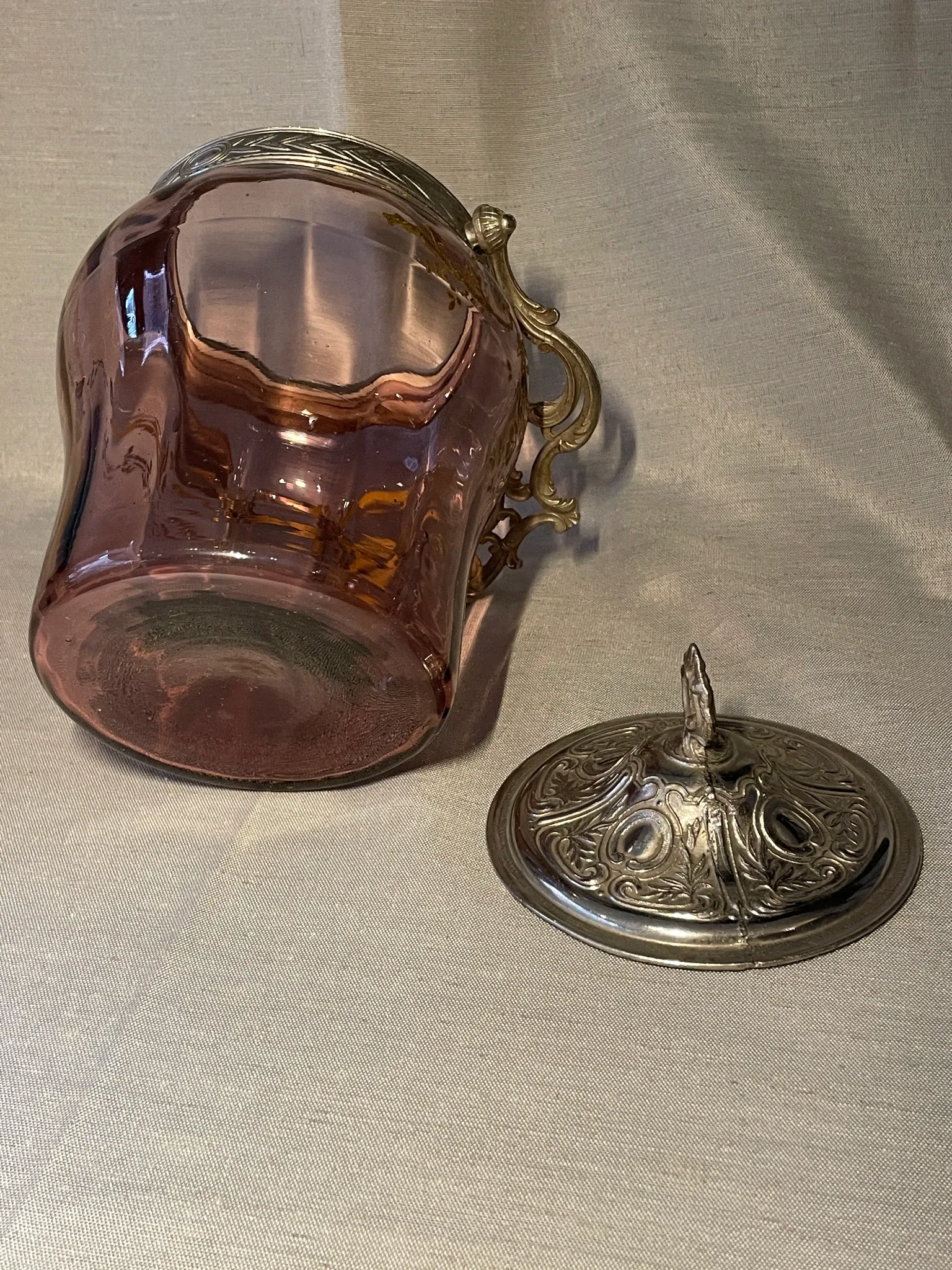 Purple glass biscuit barrel with painted gold arabesque decorations for cakes.