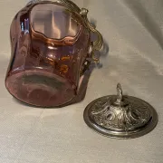 Purple glass biscuit barrel with painted gold arabesque decorations for cakes.