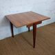 Folding three-legged game or side table from the 1960s, space-saving.